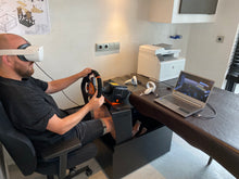 Load image into Gallery viewer, The CoffeeRacer 'Play' production sample in use with a Simucube wheelbase in high torque mode, Heusinkveld pedals and a Meta Quest 2